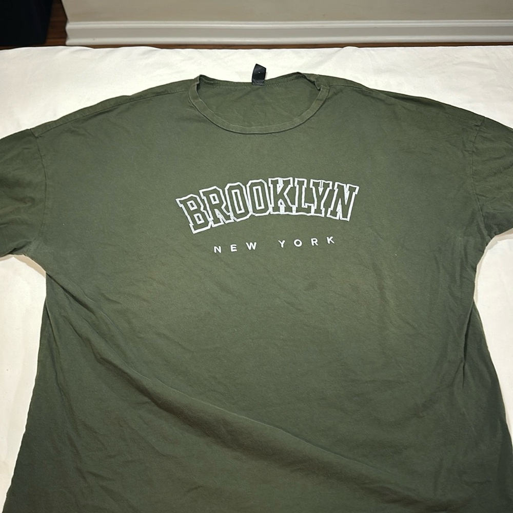 Men’s graphic tee from SHEIN size XL. Minor visible spots.